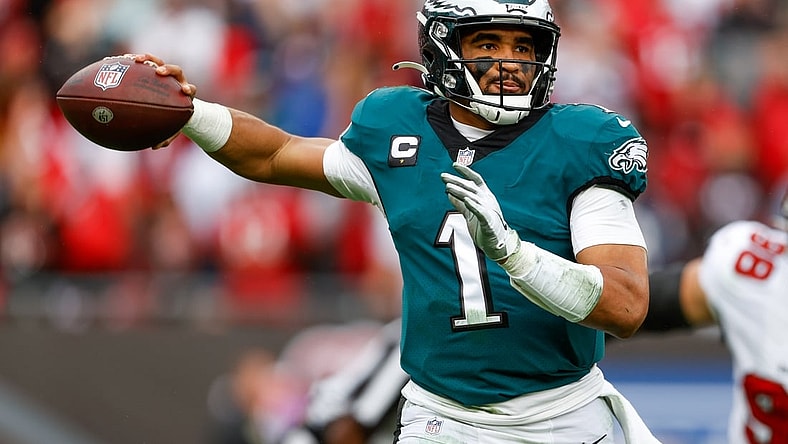 Jan 16, 2022; Tampa, Florida, USA; Philadelphia Eagles quarterback Jalen Hurts (1) looks to pass the ball in the second half against the Tampa Bay Buccaneers in a NFC Wild Card playoff football game at Raymond James Stadium. Mandatory Credit: Nathan Ray Seebeck-USA TODAY Sports