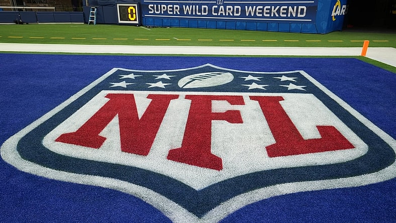 Jan 17, 2022; Inglewood, California, USA; A detailed view of a NFL shield logo in the end zone at a NFC Wild Card playoff football game at SoFi Stadium. Mandatory Credit: Kirby Lee-USA TODAY Sports