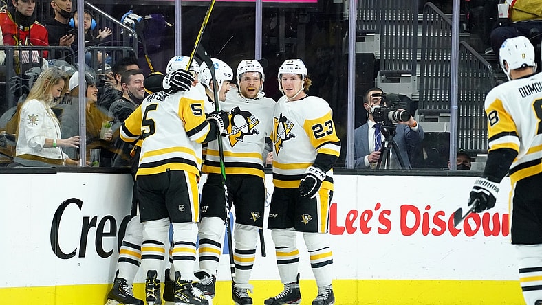 Jan 17, 2022; Las Vegas, Nevada, USA;  Pittsburgh Penguins center Teddy Blueger (53) celebrates with teammates after scoring in the second period against the Vegas Golden Knights at T-Mobile Arena. Mandatory Credit: Lucas Peltier-USA TODAY Sports
