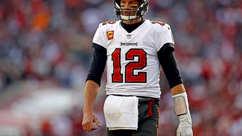 Jan 23, 2022; Tampa, Florida, USA; Tampa Bay Buccaneers quarterback Tom Brady (12) reacts during the first half against the Los Angeles Rams in a NFC Divisional playoff football game at Raymond James Stadium. Mandatory Credit: Nathan Ray Seebeck-USA TODAY Sports