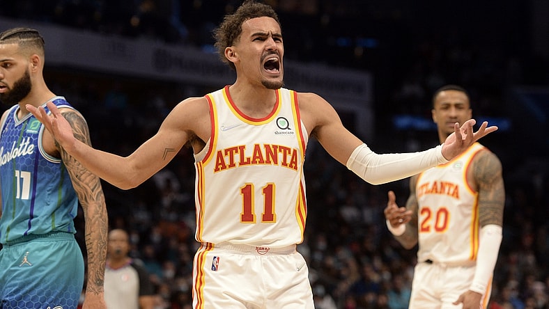 Jan 23, 2022; Charlotte, North Carolina, USA;  Atlanta Hawks guard Trae Young (11) reacts after being called on a foul during the second half against the Charlotte Hornets at The Spectrum Center. Mandatory Credit: Sam Sharpe-USA TODAY Sports