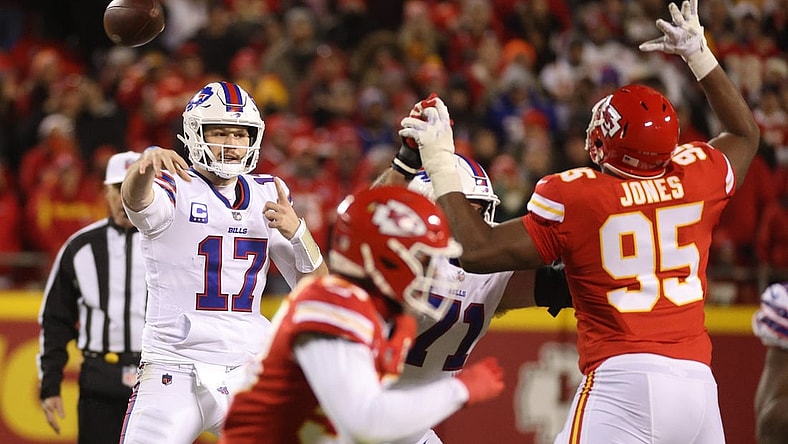 Bills quarterback Josh Allen throws over Chiefs Chris Jones.