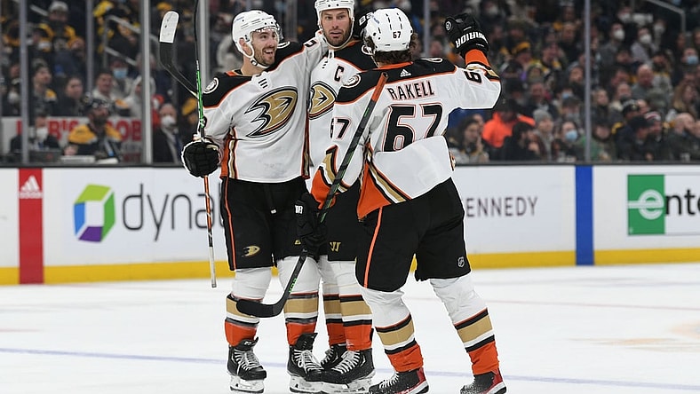 Jan 24, 2022; Boston, Massachusetts, USA; Anaheim Ducks center Ryan Getzlaf (15) celebrates with defenseman Kevin Shattenkirk (22) and left wing Rickard Rakell (67) after scoring a goal against the Boston Bruins during the second period at the TD Garden. Mandatory Credit: Brian Fluharty-USA TODAY Sports