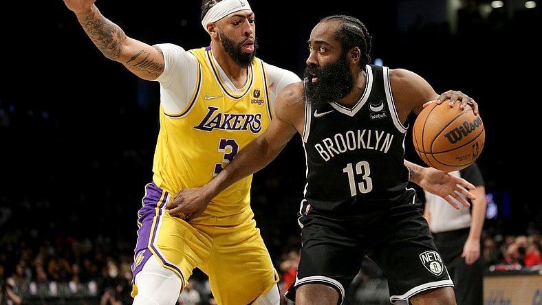 Jan 25, 2022; Brooklyn, New York, USA; Brooklyn Nets guard James Harden (13) controls the ball against Los Angeles Lakers forward Anthony Davis (3) during the third quarter at Barclays Center. Mandatory Credit: Brad Penner-USA TODAY Sports