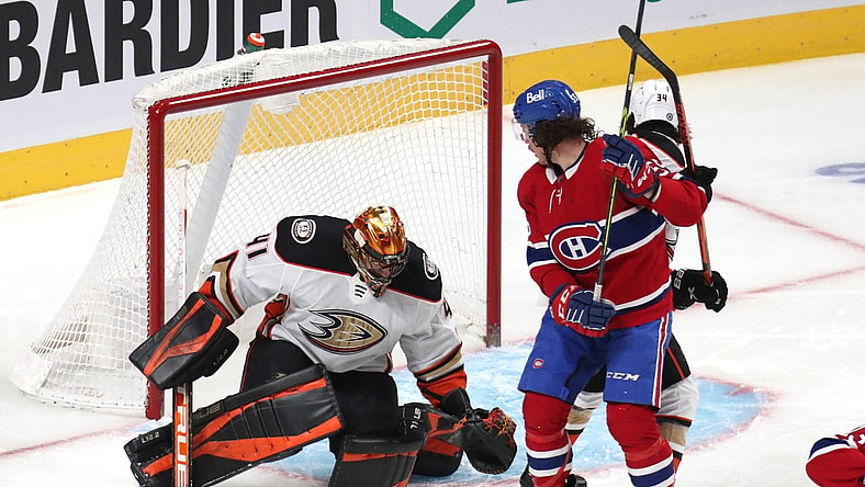 Jan 27, 2022; Montreal, Quebec, CAN; Anaheim Ducks goaltender Anthony Stolarz (41) makes a save against Montreal Canadiens left wing Michael Pezzetta (55) as defenseman Jamie Drysdale (34) defends during the first period at Bell Centre. Mandatory Credit: Jean-Yves Ahern-USA TODAY Sports