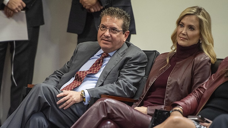 Jan 2, 2020; Ashburn, VA, USA; Washington Redskins owner Daniel Snyder and his wife Tanya look on as head coach Ron Rivera speaks during his introductory press conference at Inova Sports Performance Center. Mandatory Credit: Brad Mills-USA TODAY Sports