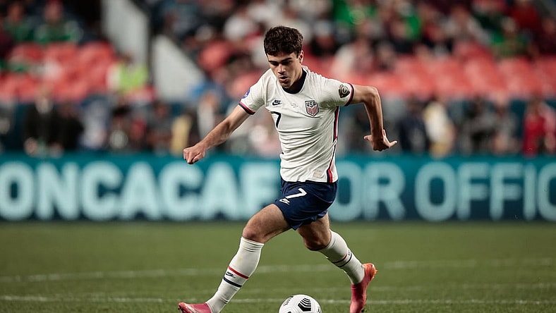 Jun 6, 2021; Denver, Colorado, USA; United States forward Gio Reyna (7) controls the ball in the second half against Mexico during the 2021 CONCACAF Nations League Finals soccer series final match at Empower Field at Mile High. Mandatory Credit: Isaiah J. Downing-USA TODAY Sports