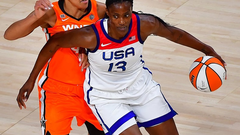 Jul 14, 2021; Las Vegas, NV, USA; Team USA center Sylvia Fowles (13) dribbles around WNBA All Star forward Brionna Jones (42) during the WNBA All Star Game at Michelob Ultra Arena at Mandalay Bay Resort. Mandatory Credit: Stephen R. Sylvanie-USA TODAY Sports