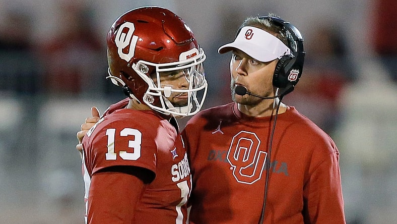OU coach Lincoln Riley and quarterback Caleb Williams (13).