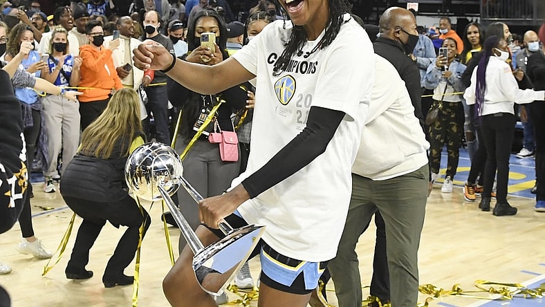 Oct 17, 2021; Chicago, Illinois, USA; Chicago Sky guard Diamond DeShields, dances with the championship trophy after the Chicago Sky beat the Phoenix Mercury 80-74 in game four of the 2021 WNBA Finals at Wintrust Arena. Mandatory Credit: Matt Marton-USA TODAY Sports