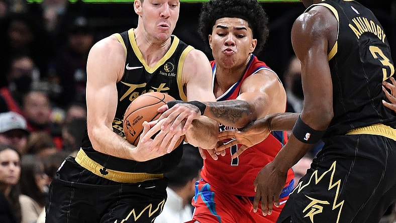 Nov 13, 2021; Toronto, Ontario, CAN; Toronto Raptors guard Goran Dragic (1) battles for the ball with Detroit Pistons guard Killian Hayes (7) in the first half at Scotiabank Arena. Mandatory Credit: Dan Hamilton-USA TODAY Sports