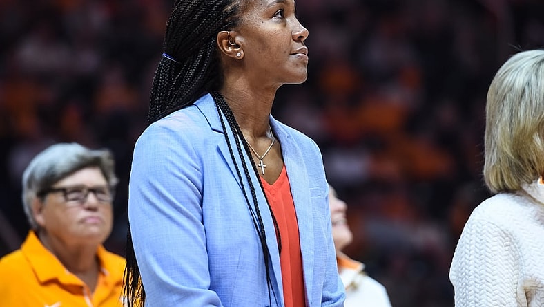 Nov 21, 2021; Knoxville, Tennessee, USA; Former Tennessee Lady Vols player Tamika Catchings watches a video as she is honored at halftime in a game against the Texas Longhorns at Thompson-Boling Arena. Mandatory Credit: Bryan Lynn-USA TODAY Sports