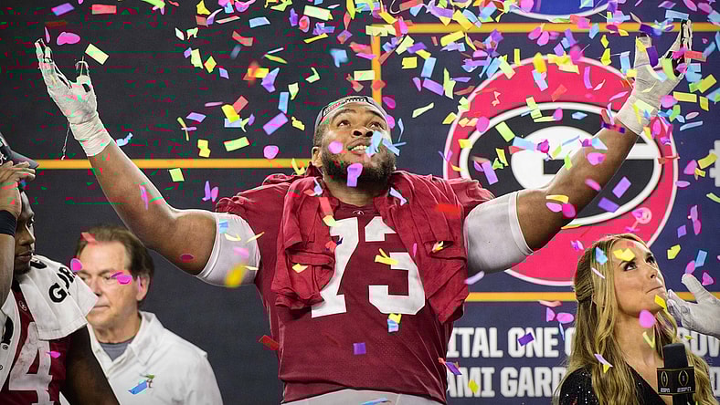 Dec 31, 2021; Arlington, Texas, USA; Alabama Crimson Tide offensive lineman Evan Neal (73) celebrates the win over the Cincinnati Bearcats after the 2021 Cotton Bowl college football CFP national semifinal game at AT&T Stadium. Mandatory Credit: Jerome Miron-USA TODAY Sports