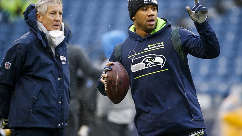 Jan 2, 2022; Seattle, Washington, USA; Seattle Seahawks quarterback Russell Wilson (3) throws during pregame warmups against the Detroit Lions at Lumen Field. Mandatory Credit: Joe Nicholson-USA TODAY Sports