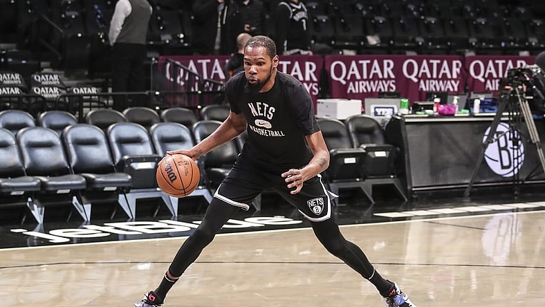 Jan 13, 2022; Brooklyn, New York, USA;  Brooklyn Nets forward Kevin Durant (7) takes warmups prior to the game against the Oklahoma City Thunder at Barclays Center. Mandatory Credit: Wendell Cruz-USA TODAY Sports
