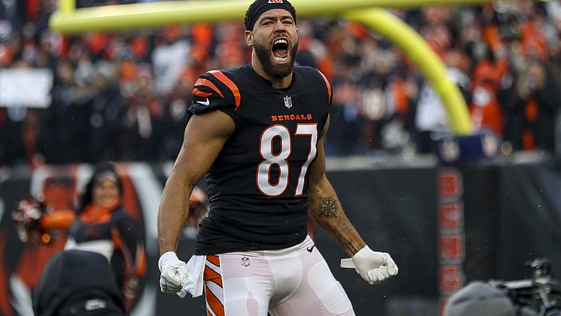 Jan 15, 2022; Cincinnati, Ohio, USA; Cincinnati Bengals tight end C.J. Uzomah (87) runs onto the field before to the game against the Las Vegas Raiders in an AFC Wild Card playoff football game at Paul Brown Stadium. Mandatory Credit: Katie Stratman-USA TODAY Sports