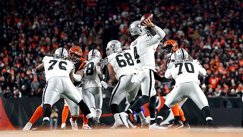 Las Vegas Raiders quarterback Derek Carr (4) throws from the pocket in the third quarter during an NFL AFC wild-card playoff game against the Cincinnati Bengals, Saturday, Jan. 15, 2022, at Paul Brown Stadium in Cincinnati. The Cincinnati Bengals defeated the Las Vegas Raiders, 26-19 to win the franchise's first playoff game in 30 years.

Las Vegas Raiders At Cincinnati Bengals Jan 15 Afc Wild Card Game