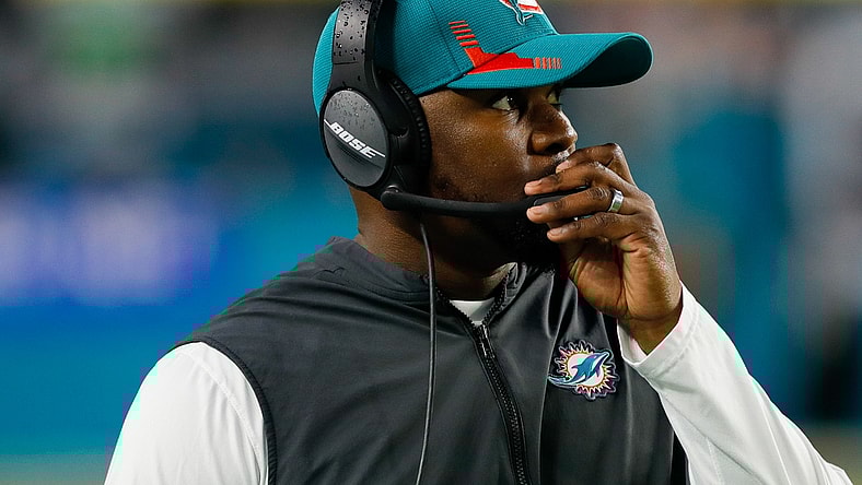 Jan 9, 2022; Miami Gardens, Florida, USA; Miami Dolphins head coach Brian Flores watches from the sideline during the second quarter of the game against the New England Patriots at Hard Rock Stadium. Mandatory Credit: Sam Navarro-USA TODAY Sports