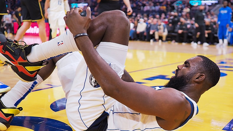 Jan 25, 2022; San Francisco, California, USA; Dallas Mavericks guard Tim Hardaway Jr. (11) on the court after an injury during the second quarter against the Golden State Warriors at Chase Center. Mandatory Credit: Kelley L Cox-USA TODAY Sports