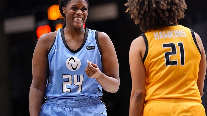 Jan 28, 2022; Las Vegas, Nevada, USA; Team Sims center Kalani Brown (24) talks with Team Mitchell forward Tianna Hawkins (21) during the third quarter at Athletes Unlimited Arena. Mandatory Credit: Lucas Peltier-USA TODAY Sports