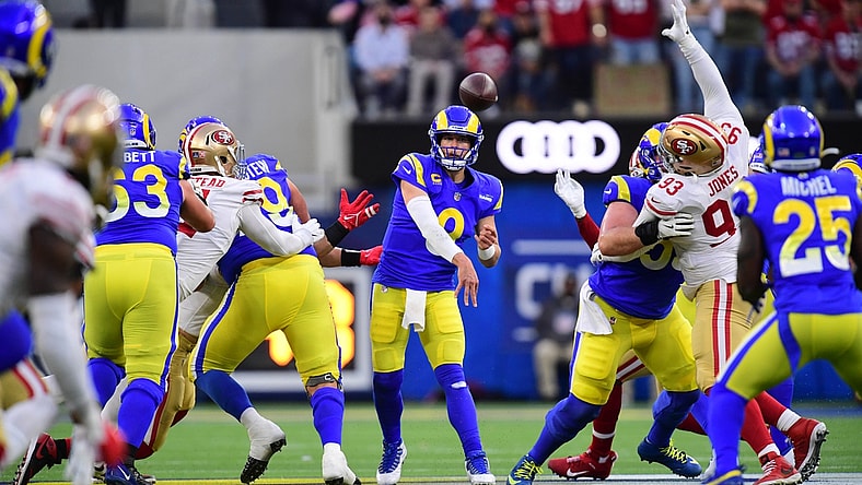 Jan 30, 2022; Inglewood, California, USA; Los Angeles Rams quarterback Matthew Stafford (9) throws a pass against the San Francisco 49ers in the first half during the NFC Championship Game at SoFi Stadium. Mandatory Credit: Gary A. Vasquez-USA TODAY Sports