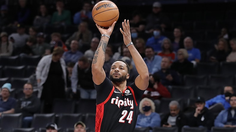 Jan 31, 2022; Oklahoma City, Oklahoma, USA; Portland Trail Blazers forward Norman Powell (24) shoots a three pointer against the Oklahoma City Thunder during the second quarter at Paycom Center. Mandatory Credit: Alonzo Adams-USA TODAY Sports