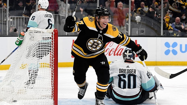 Feb 1, 2022; Boston, Massachusetts, USA; Boston Bruins left wing Taylor Hall (71) reacts after a goal scored by right wing David Pastrnak (not seen) against the Seattle Kraken during the third period at the TD Garden. Mandatory Credit: Brian Fluharty-USA TODAY Sports