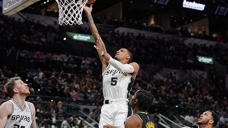 Feb 1, 2022; San Antonio, Texas, USA;  San Antonio Spurs guard Dejounte Murray (5) shoots in the first half against the Golden State Warriors at the AT&T Center. Mandatory Credit: Daniel Dunn-USA TODAY Sports