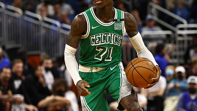 Feb 6, 2022; Orlando, Florida, USA; Boston Celtics guard Dennis Schroder (71) drives to the basket against the Orlando Magic during the second half at Amway Center. Mandatory Credit: Kim Klement-USA TODAY Sports