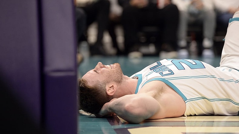 Feb 7, 2022; Charlotte, North Carolina, USA;  Charlotte Hornets guard forward Gordon Hayward (20) lays injured after a hard fall during the first half against the Toronto Raptors at the Spectrum Center. Mandatory Credit: Sam Sharpe-USA TODAY Sports