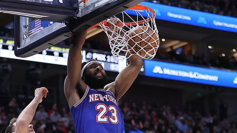 Feb 7, 2022; Salt Lake City, Utah, USA; New York Knicks center Mitchell Robinson (23) dunks the ball in the second quarter against the Utah Jazz at Vivint Arena. Mandatory Credit: Rob Gray-USA TODAY Sports