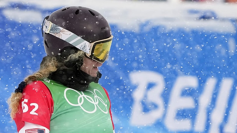 Feb 12, 2022; Zhangjiakou, China; Lindsey Jacobellis (USA) competes in the mixed snowboard cross during the Beijing 2022 Olympic Winter Games at Genting Snow Park. Mandatory Credit: Jack Gruber-USA TODAY Sports