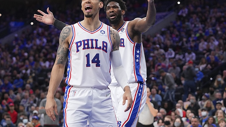 Feb 12, 2022; Philadelphia, Pennsylvania, USA; Philadelphia 76ers forward Danny Green (14) and center Joel Embiid (21) react after a foul called on Embiid against the Cleveland Cavaliers in the first half at the Wells Fargo Center. Mandatory Credit: Mitchell Leff-USA TODAY Sports
