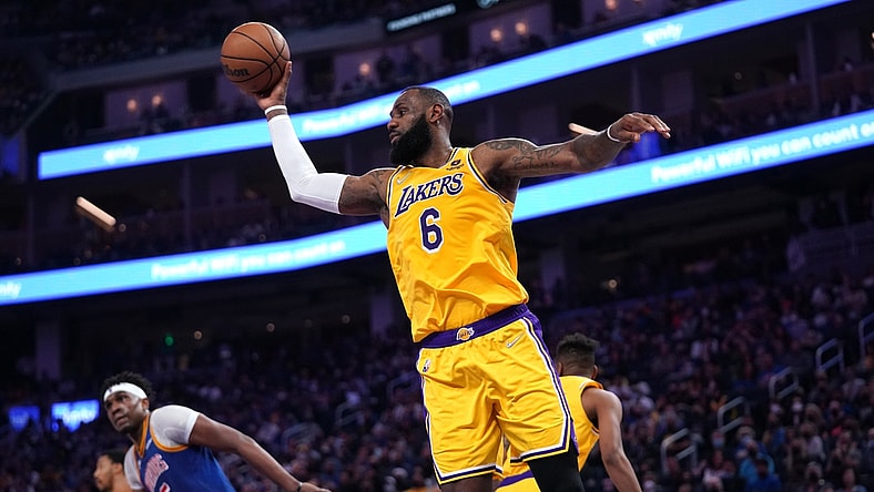 Feb 12, 2022; San Francisco, California, USA; Los Angeles Lakers forward LeBron James (6) holds onto a rebound against the Golden State Warriors in the first quarter at the Chase Center. Mandatory Credit: Cary Edmondson-USA TODAY Sports