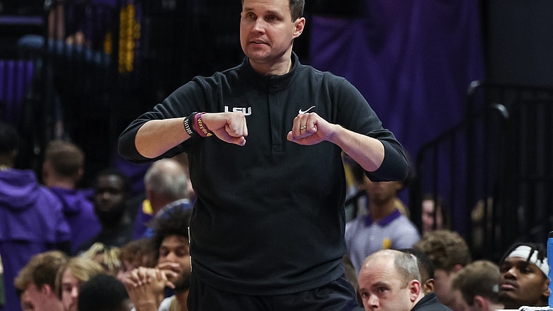 Feb 12, 2022; Baton Rouge, Louisiana, USA;  LSU Tigers coach Will Wade calls in a play from the bench against the Mississippi State Bulldogs during the second half at the Pete Maravich Assembly Center. Mandatory Credit: Stephen Lew-USA TODAY Sports