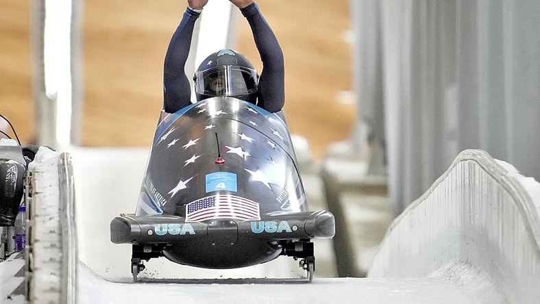 Feb 14, 2022; Yanqing, China; Elana Meyers Taylor (USA) celebrates winning the silver medal in the women   s monobob during the Beijing 2022 Olympic Winter Games at Yanqing Sliding Centre. Mandatory Credit: Harrison Hill-USA TODAY Sports