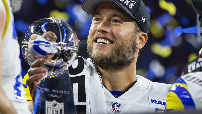 Feb 13, 2022; Inglewood, CA, USA; Los Angeles Rams quarterback Matthew Stafford celebrates with the Lombardi Trophy after defeating the Cincinnati Bengals in Super Bowl LVI at SoFi Stadium. Mandatory Credit: Mark J. Rebilas-USA TODAY Sports