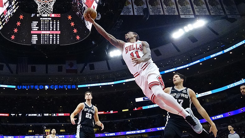 Feb 14, 2022; Chicago, Illinois, USA; Chicago Bulls forward DeMar DeRozan (11) scores against the San Antonio Spurs during the second half at United Center. Mandatory Credit: David Banks-USA TODAY Sports