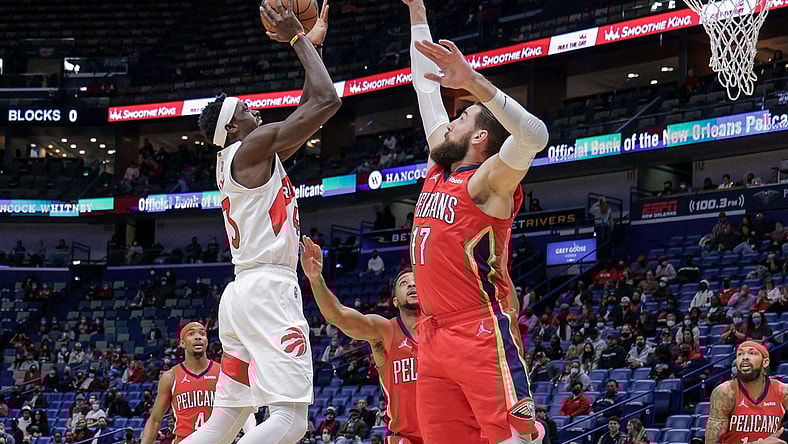 Feb 14, 2022; New Orleans, Louisiana, USA; Toronto Raptors forward Pascal Siakam (43) shoots a jump shot over New Orleans Pelicans center Jonas Valanciunas (17) during the first half at the Smoothie King Center. Mandatory Credit: Stephen Lew-USA TODAY Sports