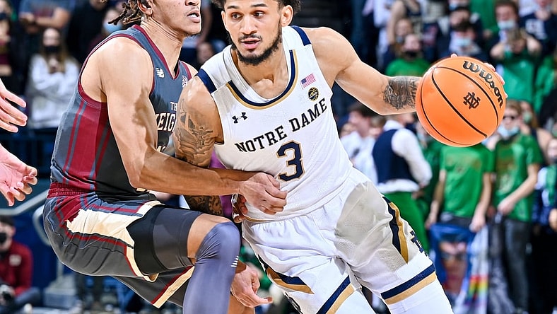Feb 16, 2022; South Bend, Indiana, USA; Notre Dame Fighting Irish guard Prentiss Hubb (3) drives to the basket as Boston College Eagles guard Makai Ashton-Langford (11) defends in the second half at the Purcell Pavilion. Mandatory Credit: Matt Cashore-USA TODAY Sports