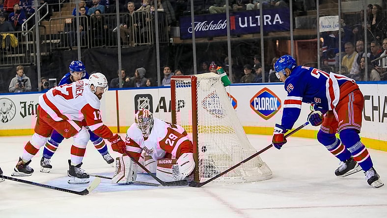 Feb 17, 2022; New York, New York, USA; New York Rangers defenseman K'Andre Miller (79) scores a wrap-around goal on Detroit Red Wings defenseman Gustav Lindstrom (28) during the second period at Madison Square Garden. Mandatory Credit: Danny Wild-USA TODAY Sports