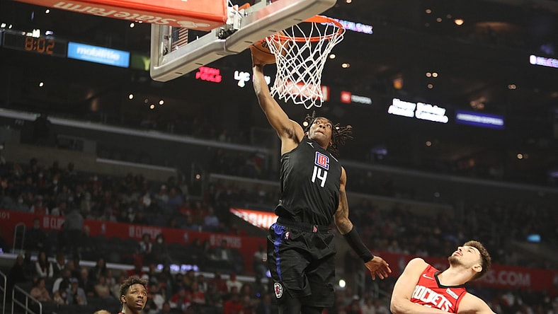 Feb 17, 2022; Los Angeles, California, USA; Los Angeles Clippers guard Terance Mann (14) dunks a ball during the first quarter against the Houston Rockets at Crypto.com Arena. Mandatory Credit: Kiyoshi Mio-USA TODAY Sports