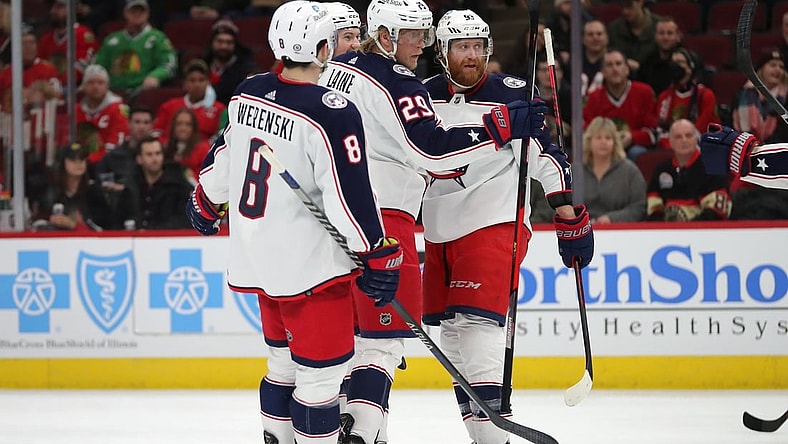 Feb 17, 2022; Chicago, Illinois, USA; Columbus Blue Jackets left wing Patrik Laine (29) is congratulated for scoring a goal during the third period against the Chicago Blackhawks at the United Center. Mandatory Credit: Dennis Wierzbicki-USA TODAY Sports