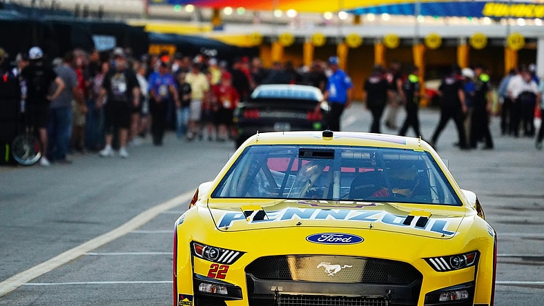Feb 18, 2022; Daytona Beach, Florida, USA; NASCAR Cup Series driver Joey Logano (22) heads out of the garage area during practice for the Daytona 500 at Daytona International Speedway. Mandatory Credit: John David Mercer-USA TODAY Sports
