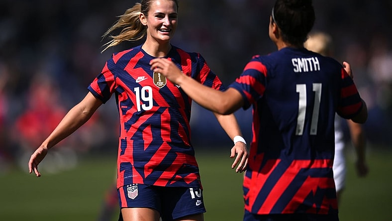 Feb 20, 2022; Carson, California, USA; United States defender Emily Fox (19) and forward Sophia Smith (11) celebrate after an own goal by New Zealand during the first half in a 2022 SheBelieves Cup international soccer match at Dignity Health Sports Park. Mandatory Credit: Orlando Ramirez-USA TODAY Sports
