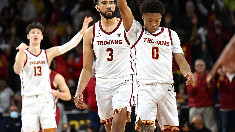 Feb 20, 2022; Los Angeles, California, USA;  USC Trojans guard Boogie Ellis (0) celebrates after shooting the winning basket with seconds on the clock to defeat the Washington State Cougars at Galen Center. Mandatory Credit: Jayne Kamin-Oncea-USA TODAY Sports