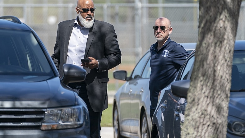 Feb 23, 2022; Jupiter, FL, USA;  Major League Baseball Players Association executive director Tony Clark, left, and chief negotiator Bruce Meyer, arrive for contract negotiations at Roger Dean Stadium in Jupiter, Florida on February 23, 2022.  Mandatory Credit: Greg Lovett-USA TODAY NETWORK