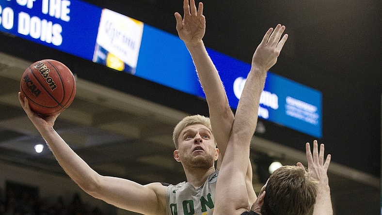 Feb 24, 2022; San Francisco, California, USA; San Francisco Dons forward Yauhen Massalski (25) goes up for a shot over Gonzaga Bulldogs forward Drew Timme (2) during the first half at War Memorial at the Sobrato Center. Mandatory Credit: D. Ross Cameron-USA TODAY Sports