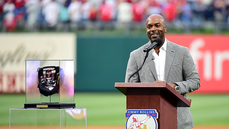 May 4, 2019; Philadelphia, PA, USA; Former Philadelphia Phillies shortstop Jimmy Rollins (center) is honored during his retirement ceremony prior to the game against the Washington Nationals at Citizens Bank Park. Mandatory Credit: Evan Habeeb-USA TODAY Sports