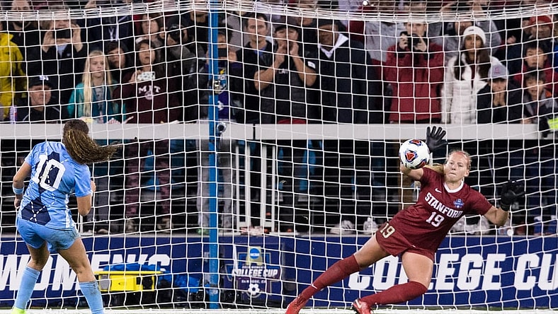 Dec 8, 2019; San Jose, CA, USA; Stanford Cardinal goalkeeper Katie Meyer (19) dives for a penalty kick by North Carolina Tar Heels forward/Midfielder Rachel Jones (10) in the College Cup championship match at Avaya Stadium. Mandatory Credit: John Hefti-USA TODAY Sports